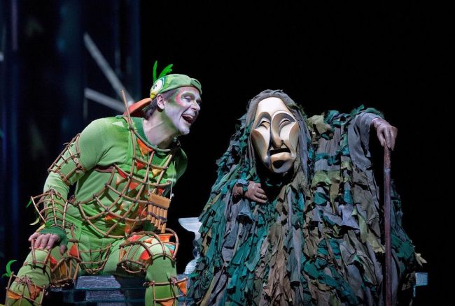Nathan Gunn (left) as Papageno in the abridged, English-language holiday presentation of Mozart's "The Magic Flute." Photo: Ken Howard/Metropolitan Opera