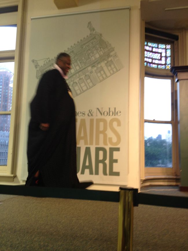 Andre Leon Talley approaching the stage