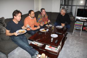The men having a ootball moment DURING THE PARTY