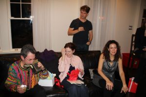 Jennifer opening a Secret Santa Present 