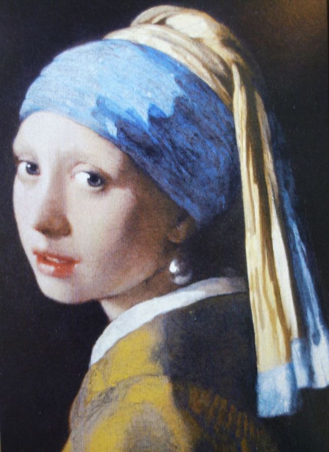 Photo of postcard of Johannes Vermeer's "Girl with a Pearl Earring," Oil on canvas ca.1665
