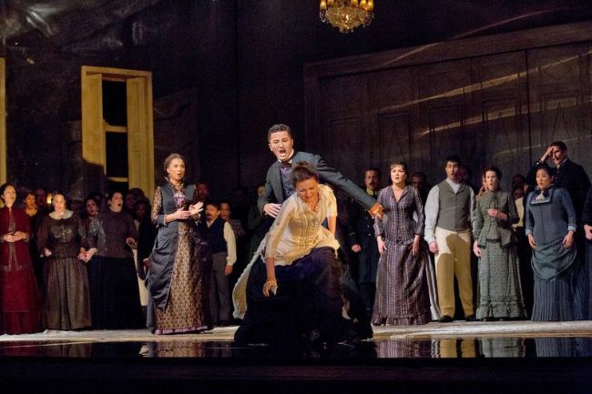Elena Zaremba as Mme Larina, Piotr Beczala as Lenski, and Oksana Volkova as Olga in Tchaikovsky's "Eugene Onegin." Photo: Ken Howard/Metropolitan Opera