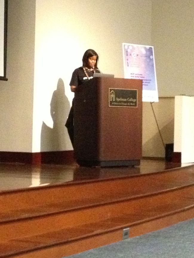 Curator of Spellman Fine Art Museum making opening remarks