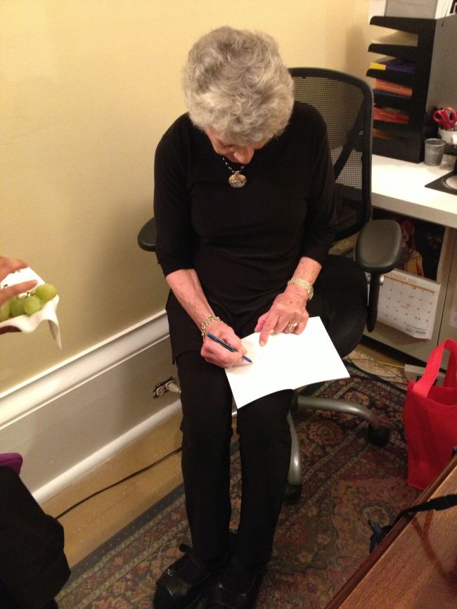 Lucinda signing Layla's book