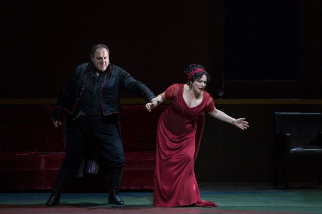 George Gagnidze as Scarpia and Patricia Racette as the title character in a scene from Act II of Puccini's "Tosca."  Photo: Marty Sohl/Metropolitan Opera