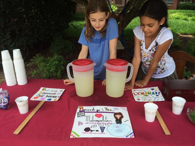 Lia & Layla sell Lemonade to benefit the Met Opera