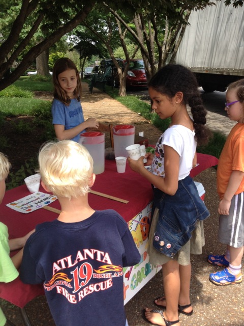 Lia & Layla sell Lemonade to benefit the Met Opera