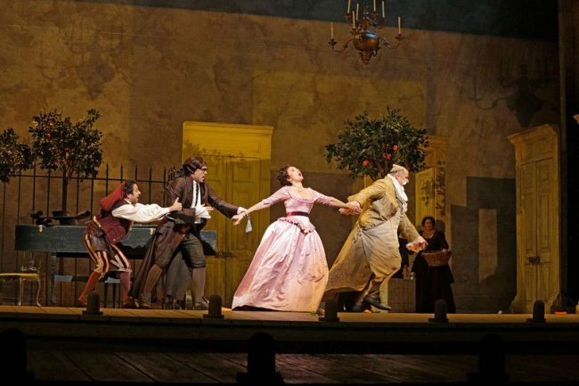A scene from Rossini's "Il Barbiere di Siviglia," with Isabel Leonard (center) as Rosina. Photo: Ken Howard/Metropolitan Oper