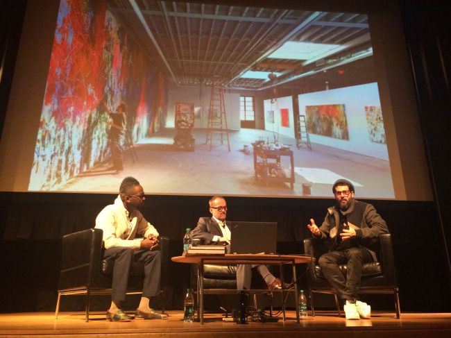 Fahamu, Michael and Jose with an image of Jose's studio