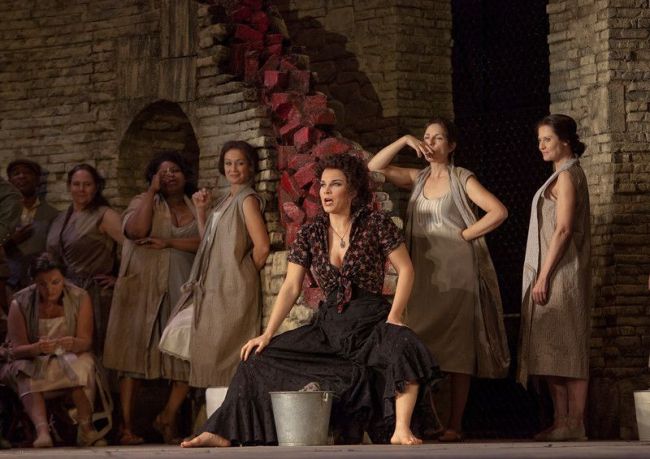 A scene from Act I of Bizet’s “Carmen” with Elina Garanca in the title role.  Photo: Ken Howard/Metropolitan Opera